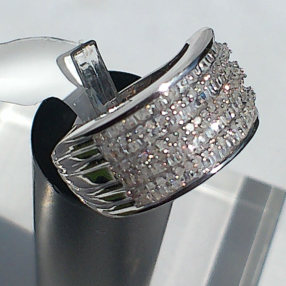 1.0 CTW Diamond Ring Platinum over 925 Brand new. size 8. great sparkle.